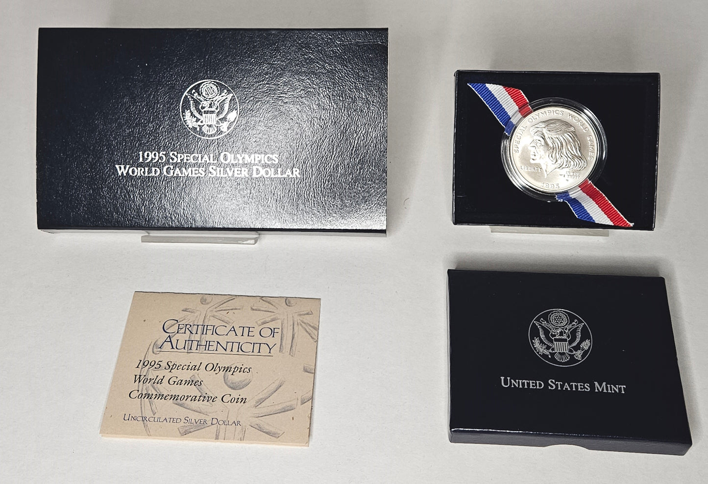 1995-W Special Olympics World Games Commemorative Silver Dollar  Uncirculated  West Point Mint!!!