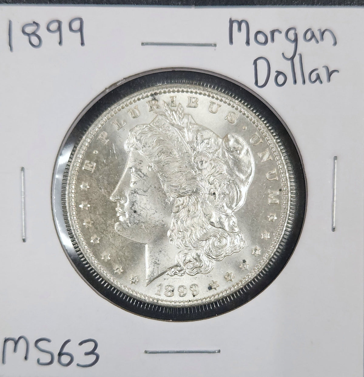 1899 Morgan Dollar MS63 7502.63-A — Obverse