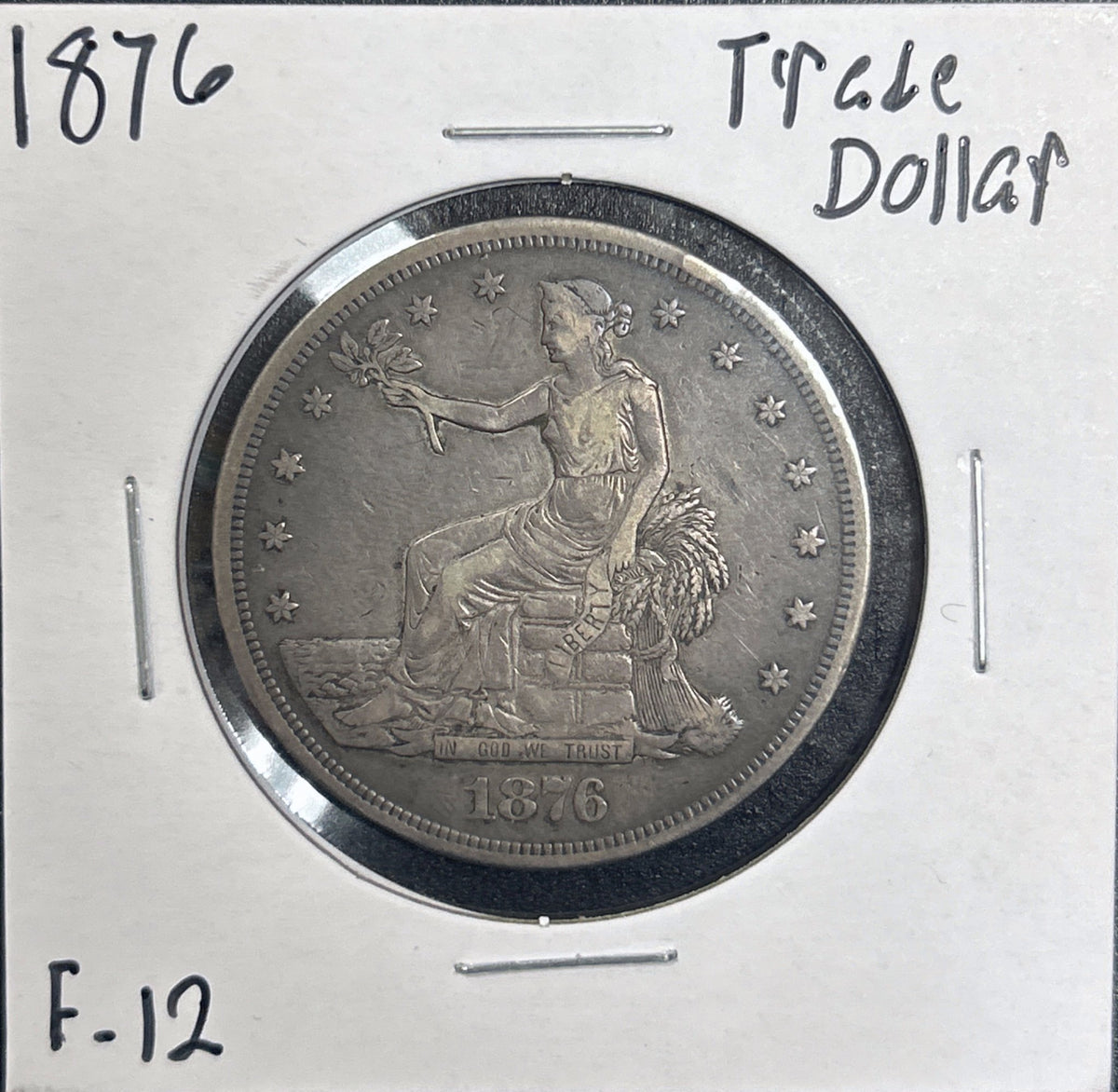 1876 Trade Dollar 7355.12-A — Obverse